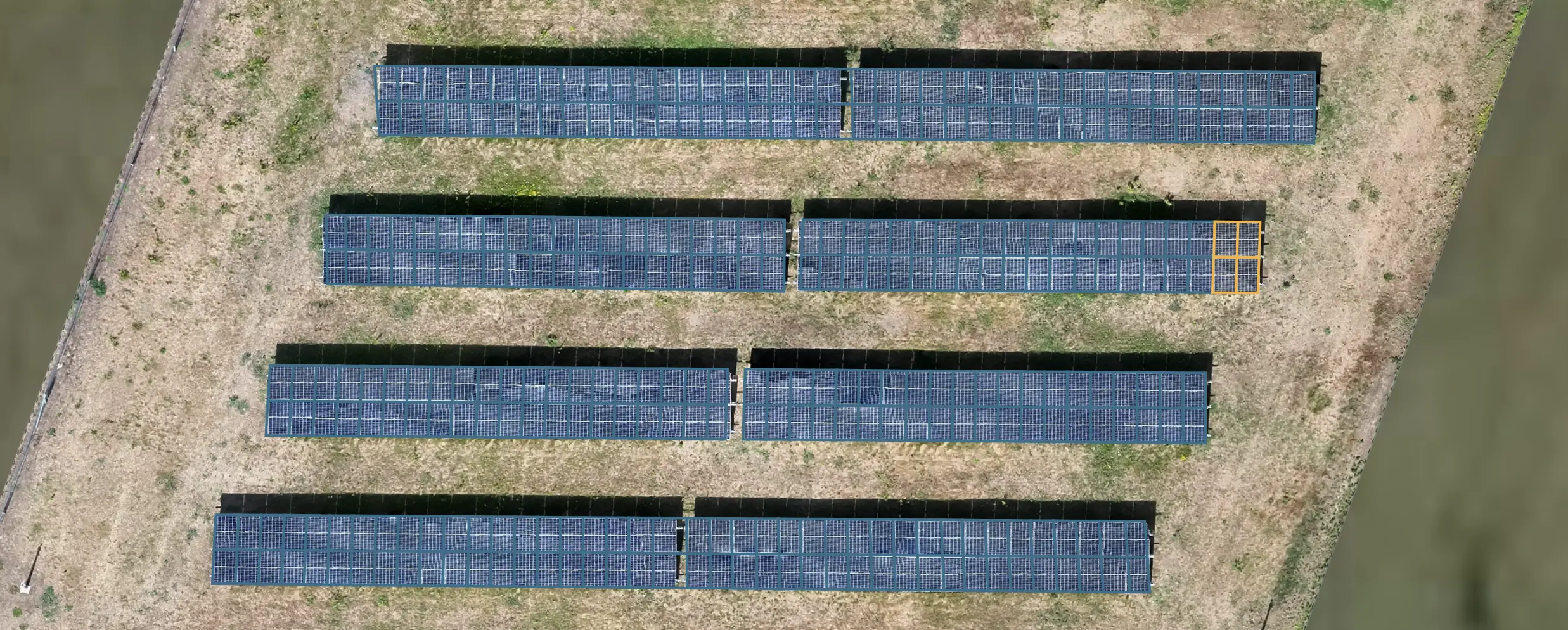 Automatically detected solar panel outlines displayed on an RGB drone orthomosaic